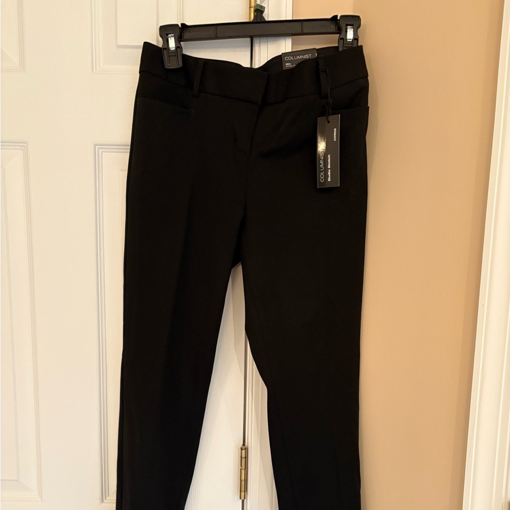 Express black pants Size 2 slim . New with tags. Studio stretch fabric